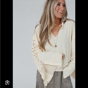 Laces out color block top